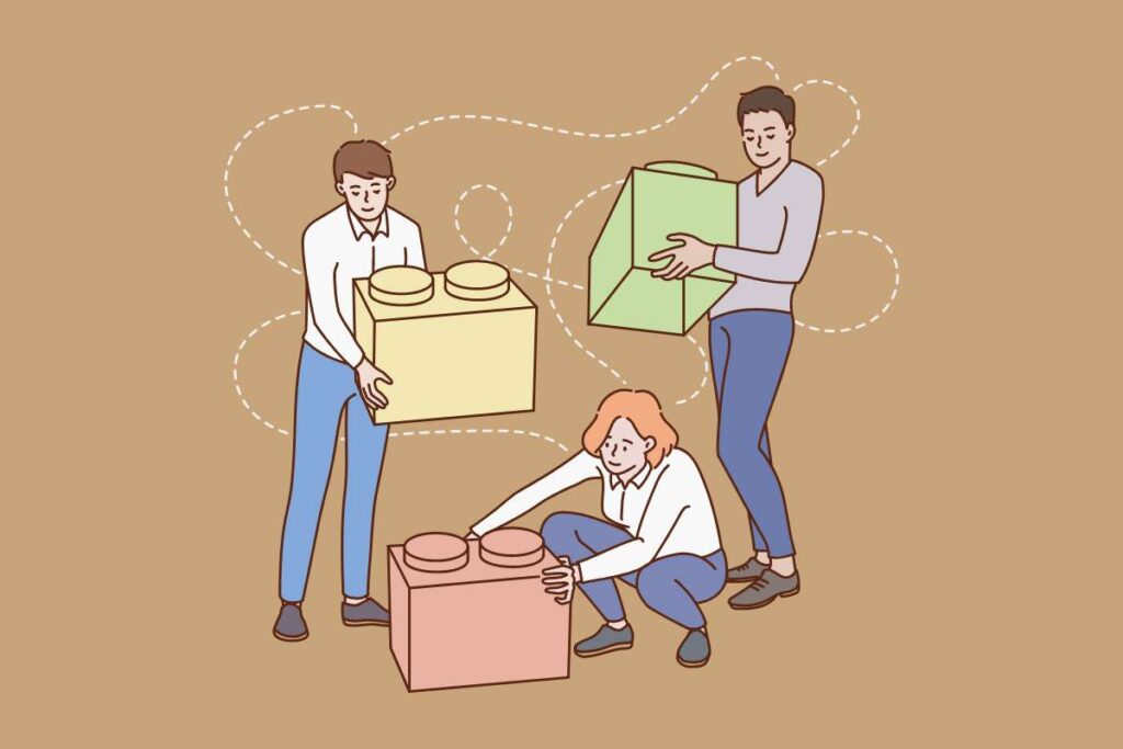 Vektorska slika, ki s pomočjo lego kock prikazuje sodelovanje na delovnem mestu.