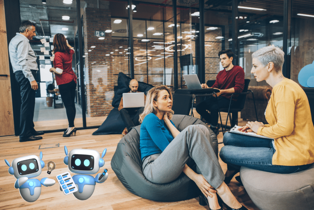 uvedba-AI-v-kadrovske procese Skupina ljudi v pisarni med pogovorom o uvedbi AI v kadrovske procese