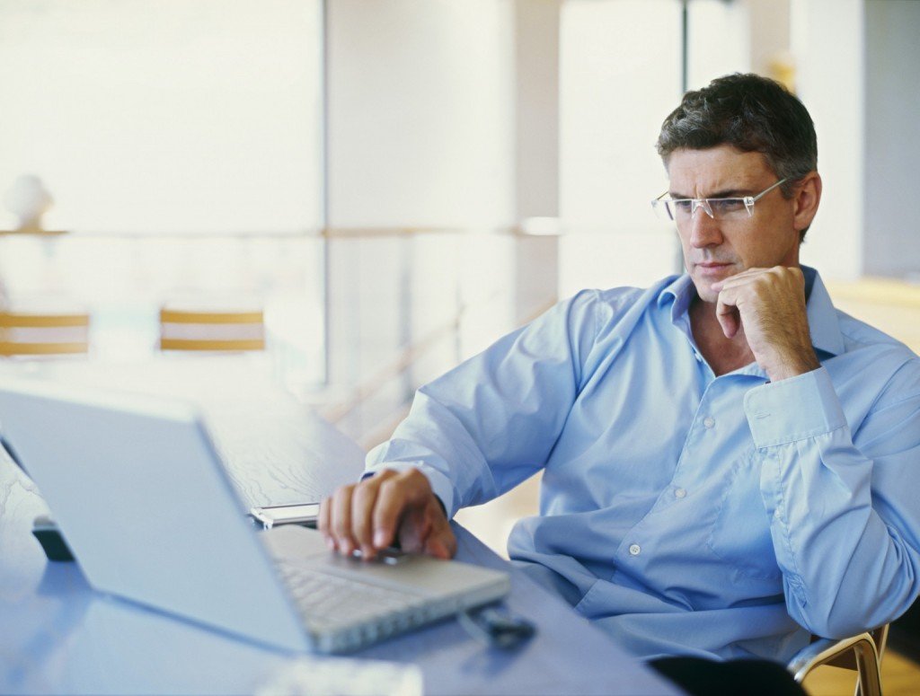 Man-on-computer-1024x775